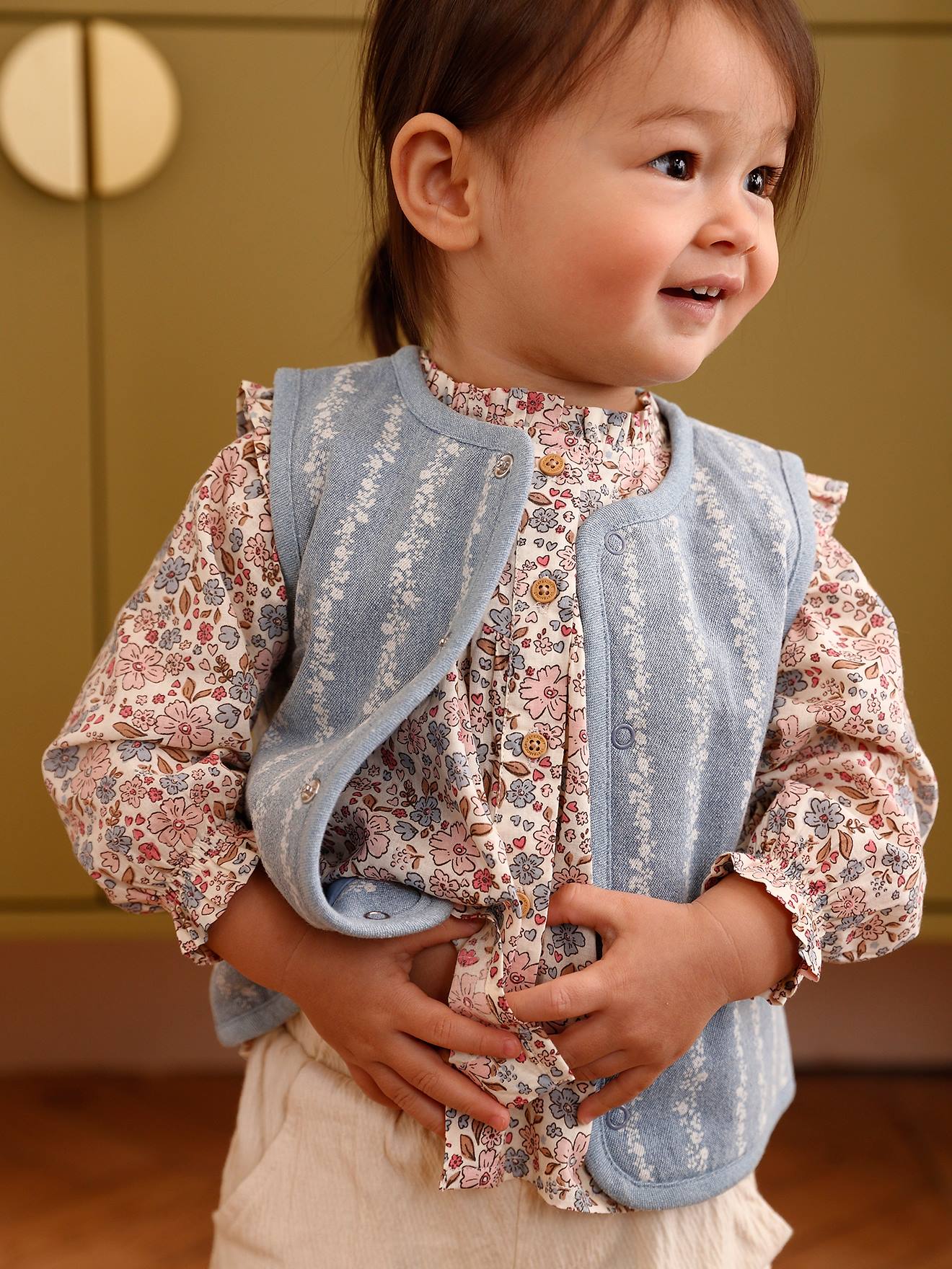 Mouwloos baby vestje denim bloemen stone