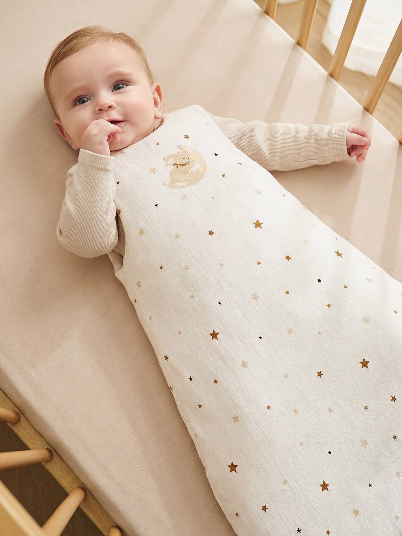 Trappelzak baby van gewafelde jersey ecru