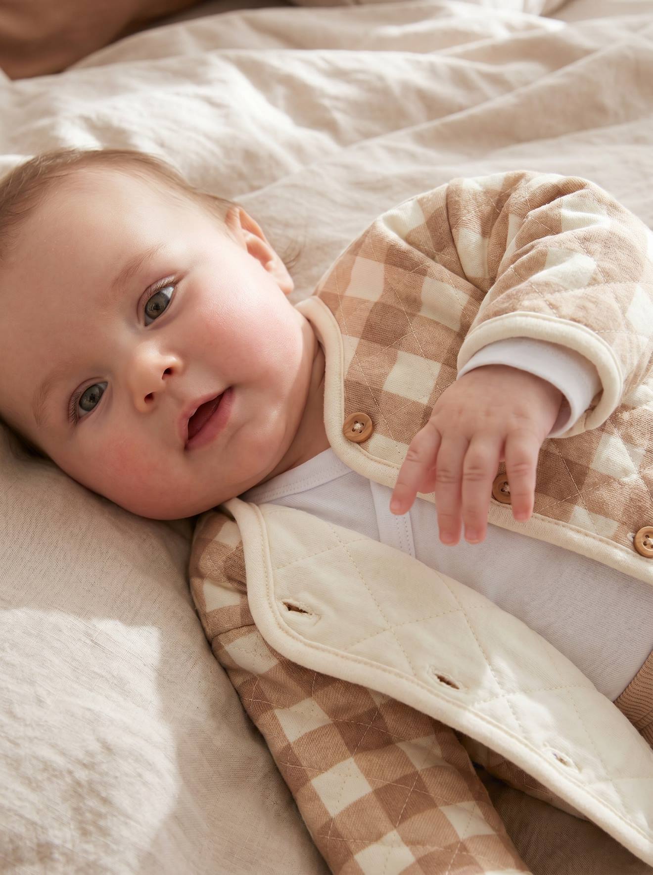 Gewatteerd newborn vest ecru