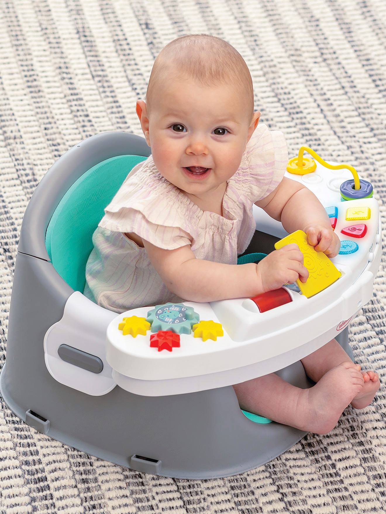 Ontdekkingsstoel en stoelverhoger met muziek en licht 3-in-1 Infantino grijs