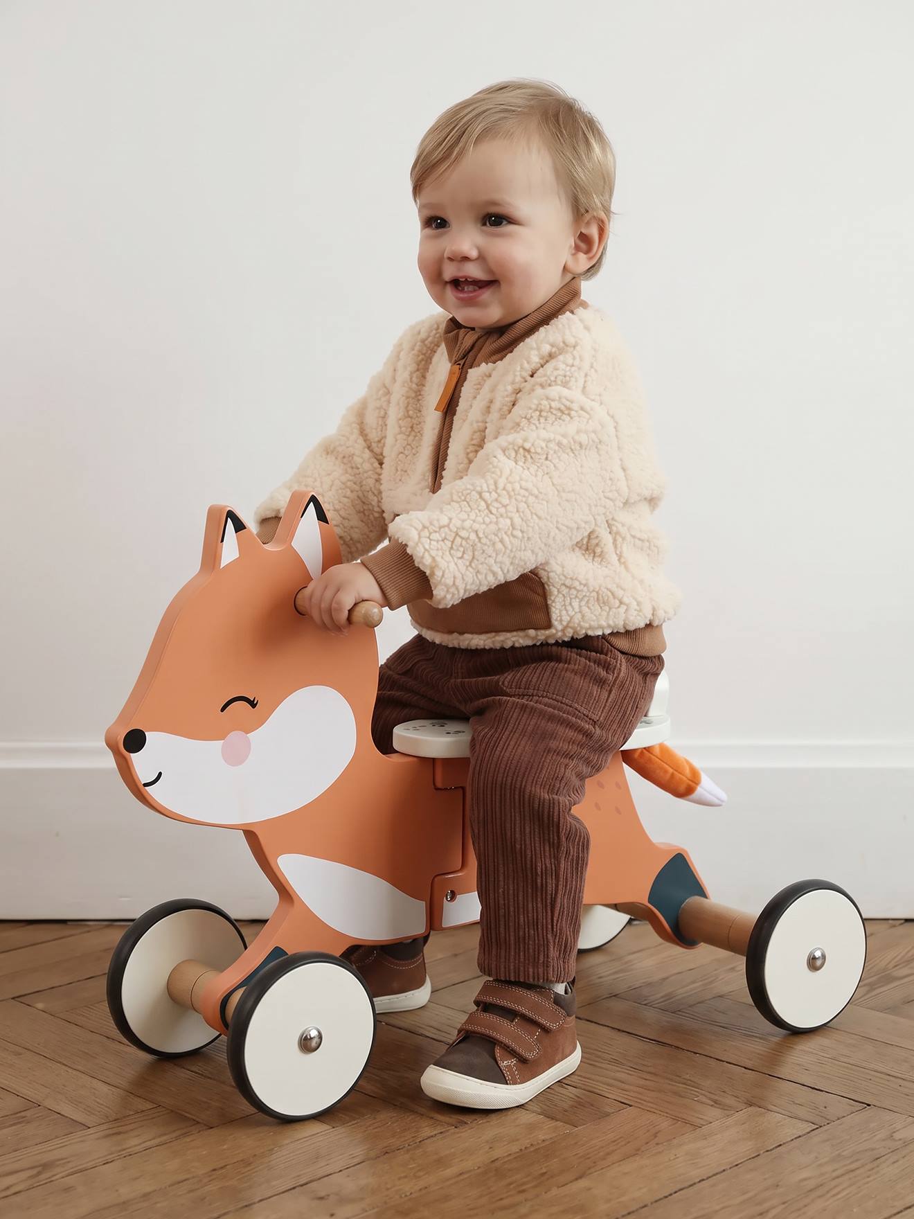 Houten FSCÂ® loopwagen in de vorm van een vos sinaasappel