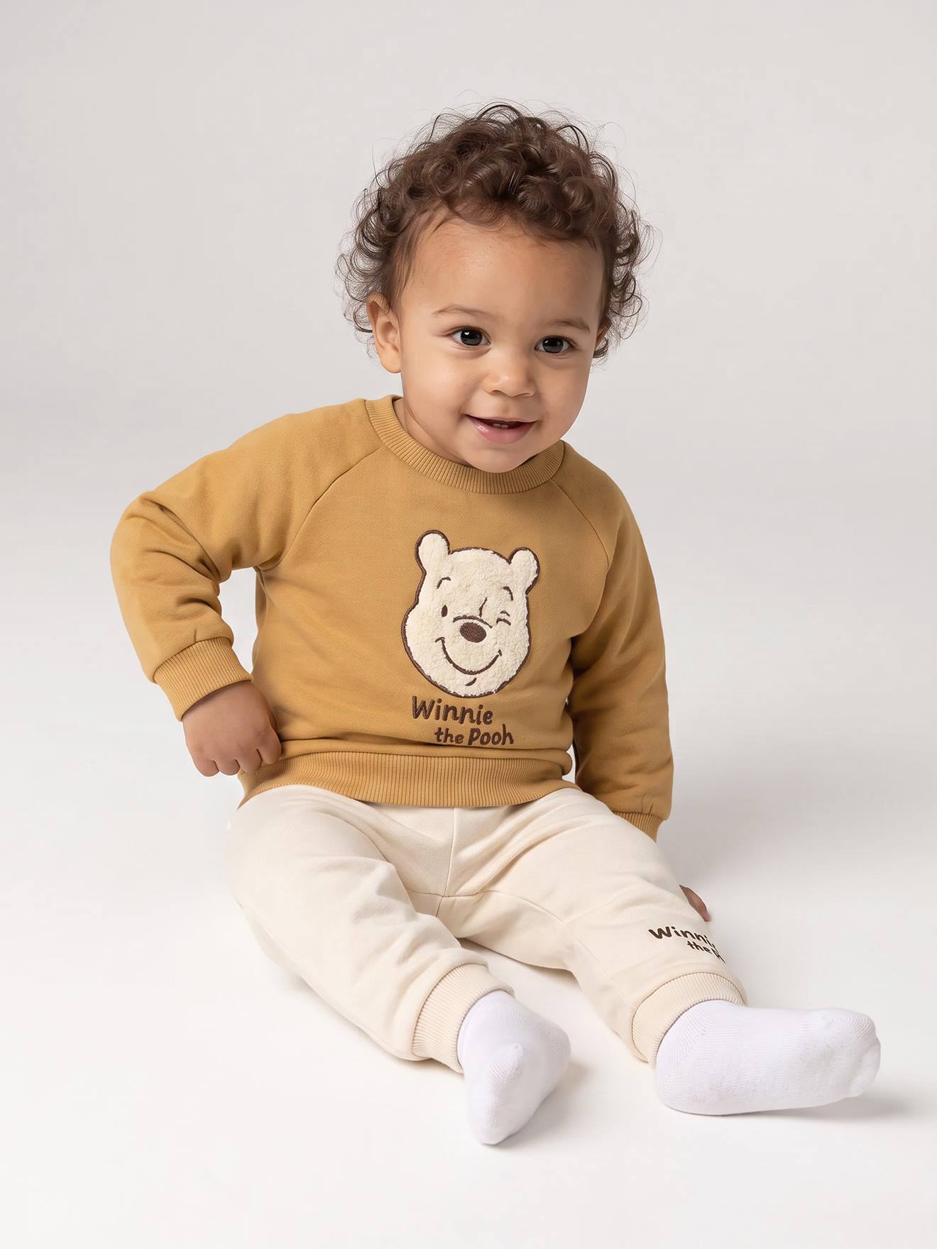 Babyset jongen WINNIE THE POOH currygeel