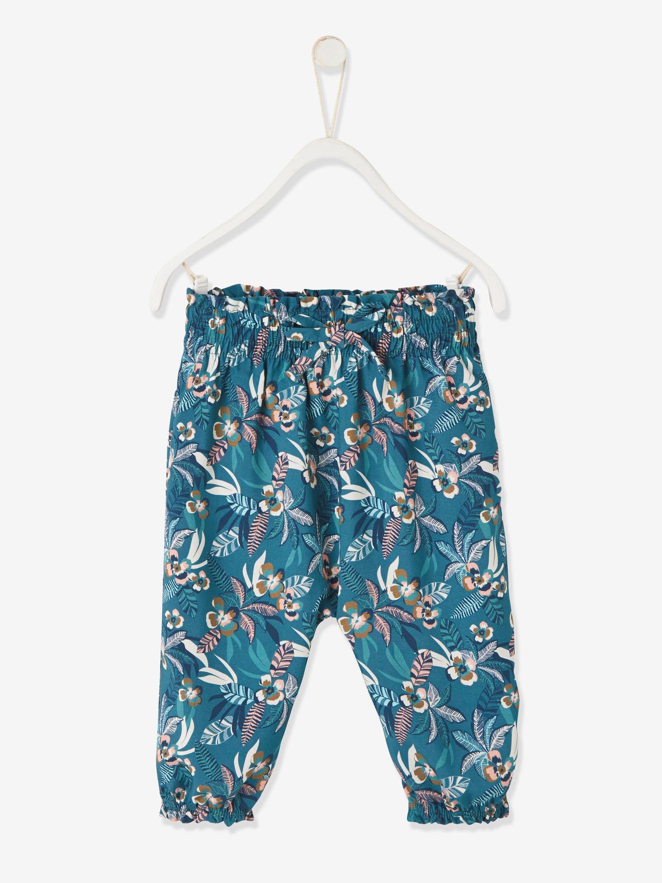 Losse babybroek met print groen met print