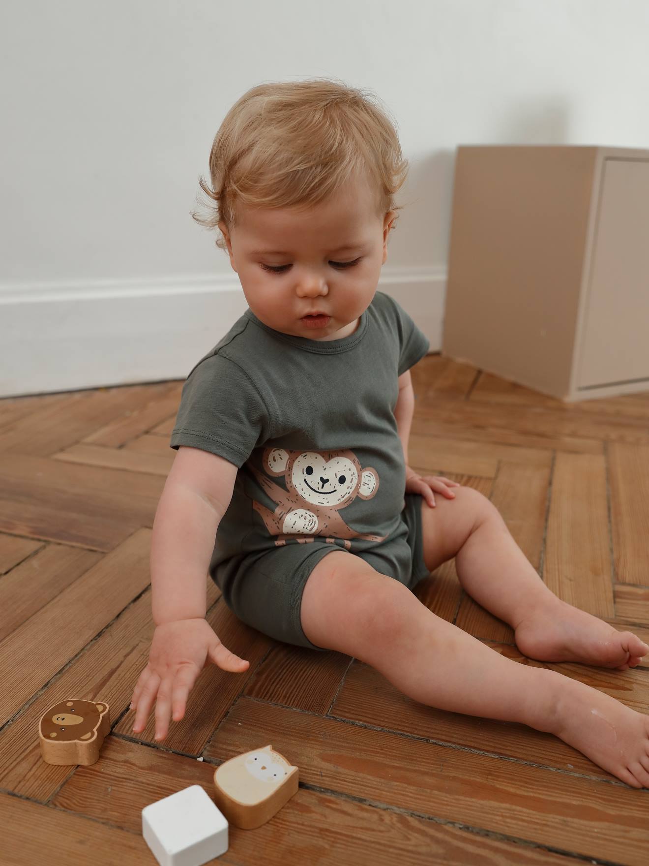 Playsuit voor baby met dieren kaki