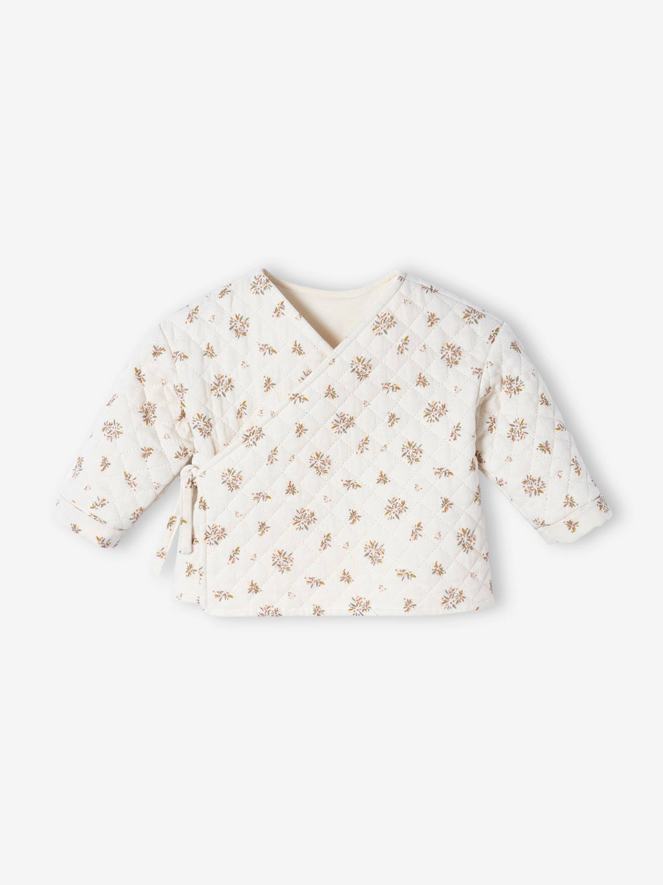 Gewatteerd babyvestje met dubbele borstband beige met print