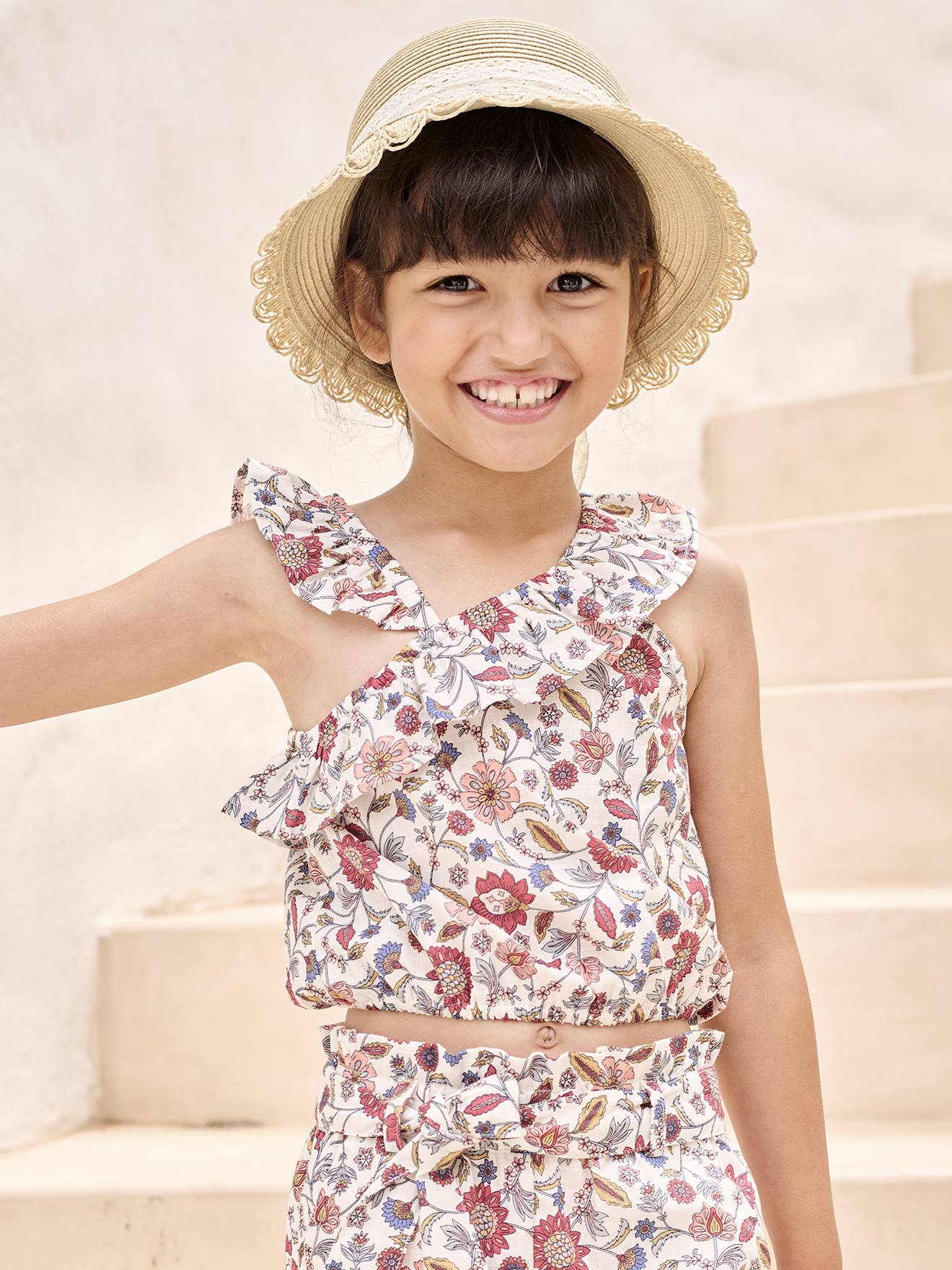 Asymmetrische meisjesblouse met bloemenprint en volant ecru