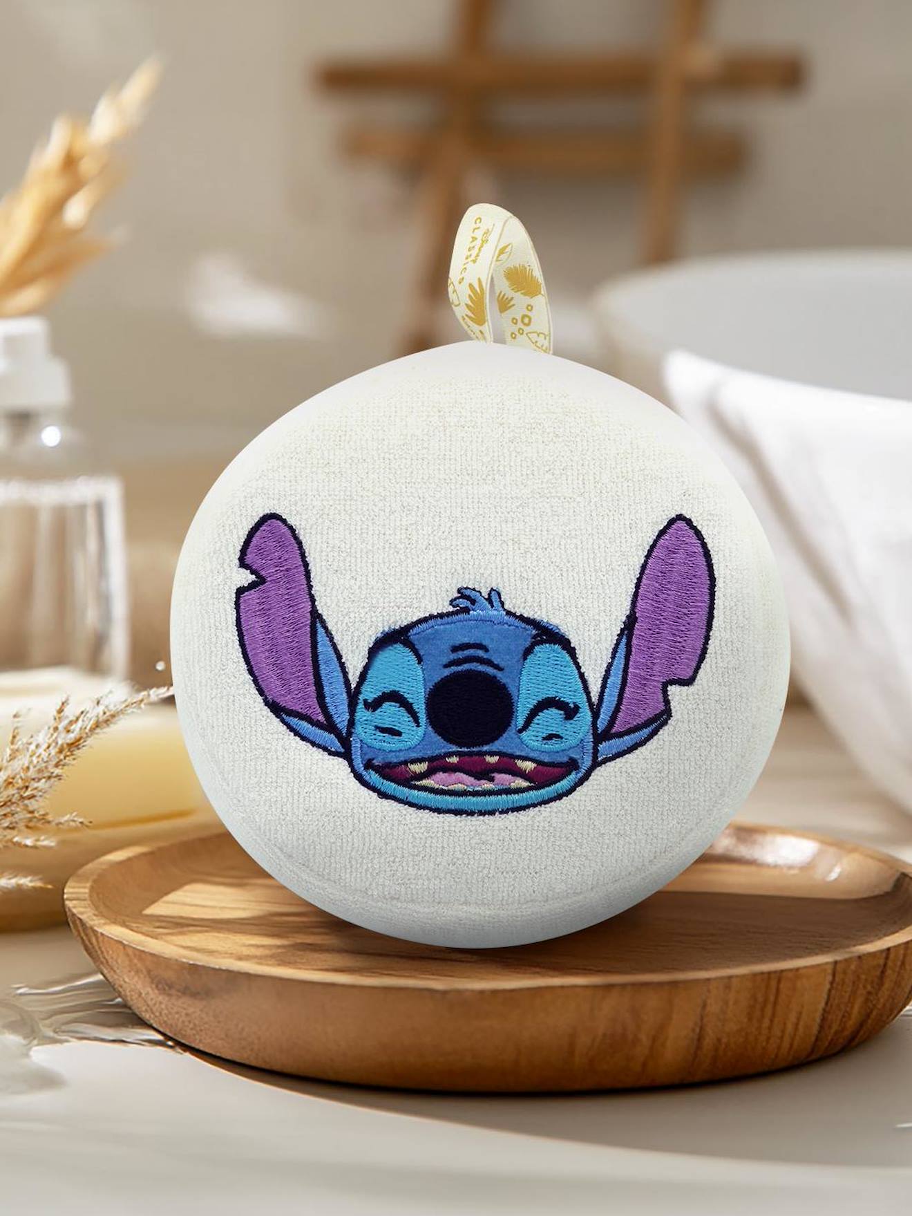 Geborduurde Disney®-babyspons met Stitch-hoofd ecru afbeelding