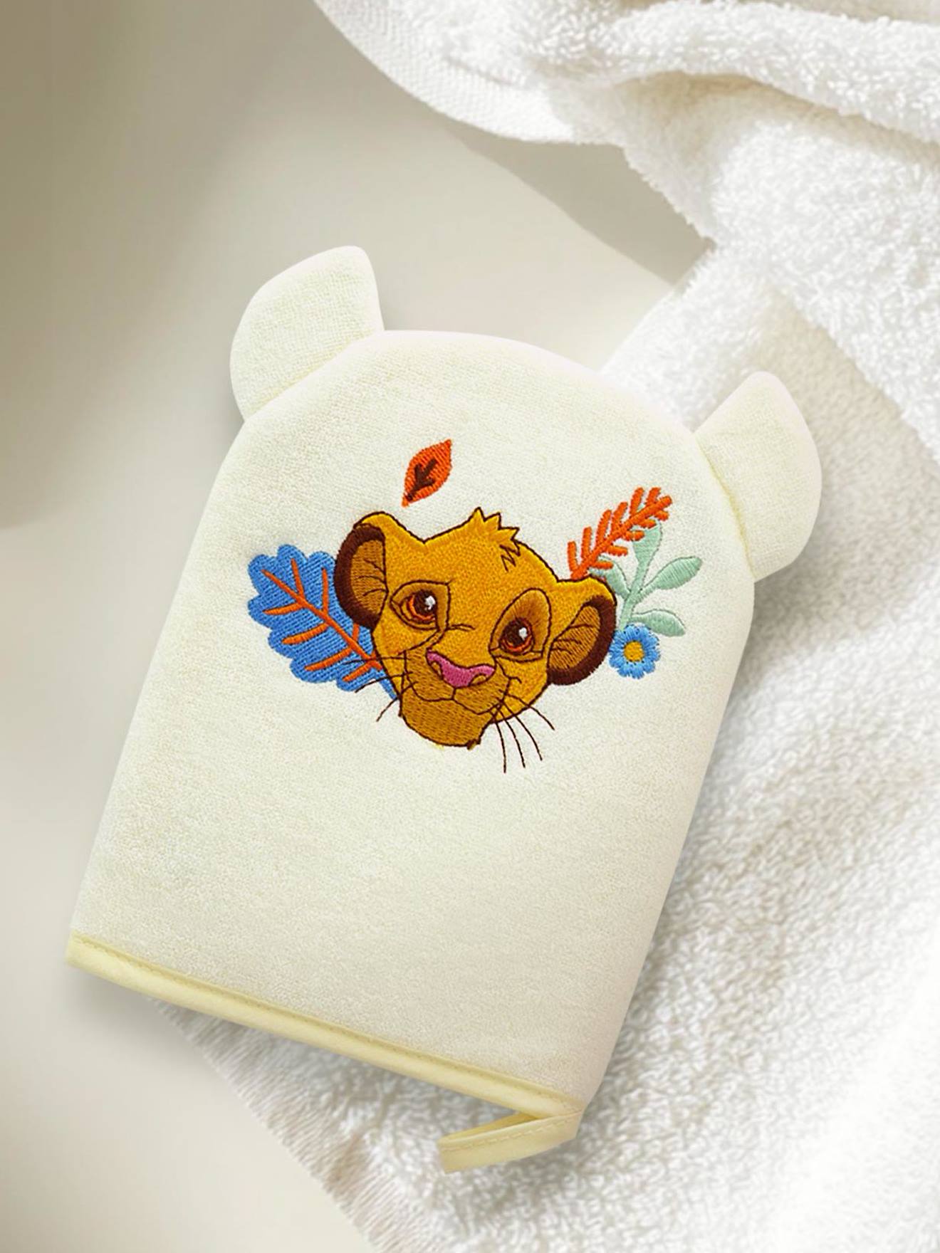 Leuk Disney® washandje geborduurd met het hoofd van Simba pastelgeel
