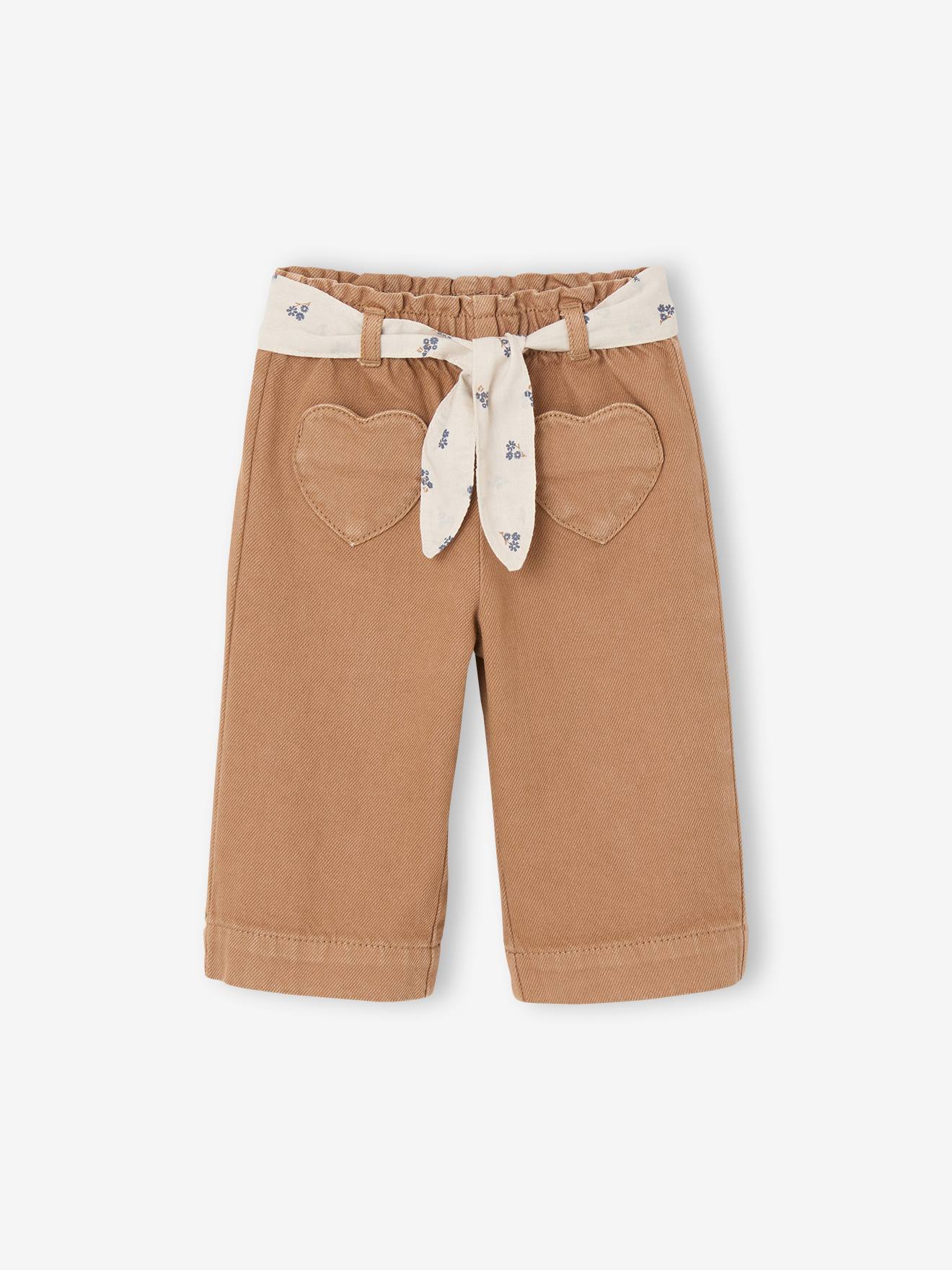 Wijde broek met kleur babymeisje met riem om te strikken karamel afbeelding