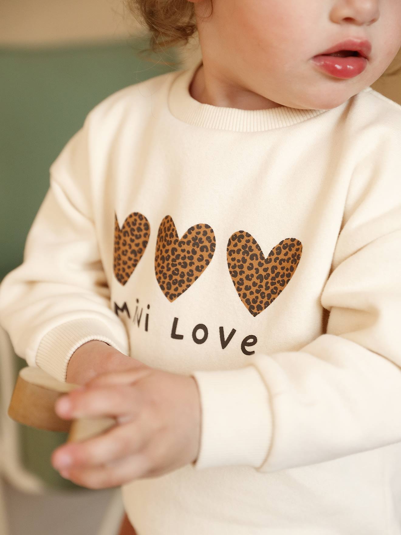 Baby sweater met bedrukte boodschap vanille afbeelding