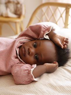Baby-Geboorteblouse in geruite flanellen stof met ruches.