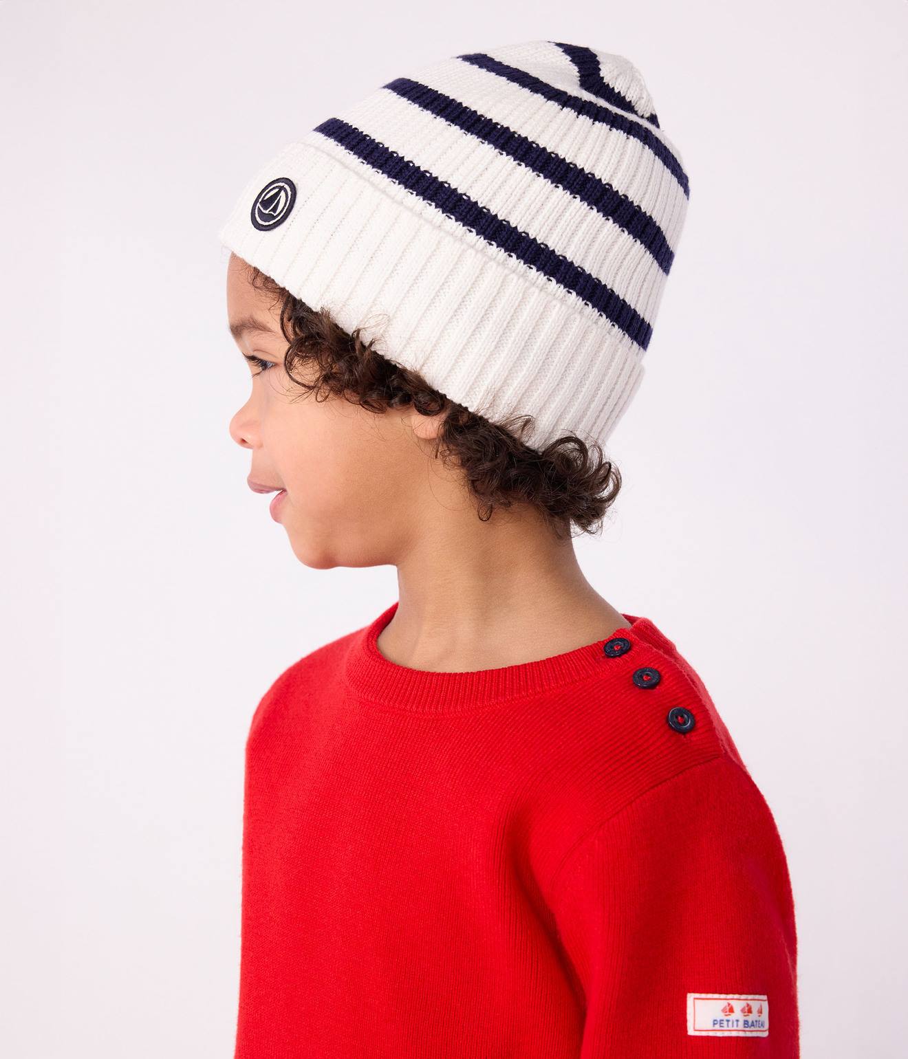 Gestreepte PETIT BATEAU muts voor kinderen van gebreide stof met fleece voering marineblauw afbeelding